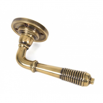 Aged Brass Reeded Lever On Rose Set