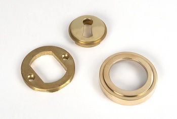 Polished Brass Round Escutcheon (Art Deco)